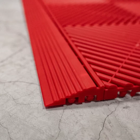 Close up photograph of red Swsistrax ramp edge