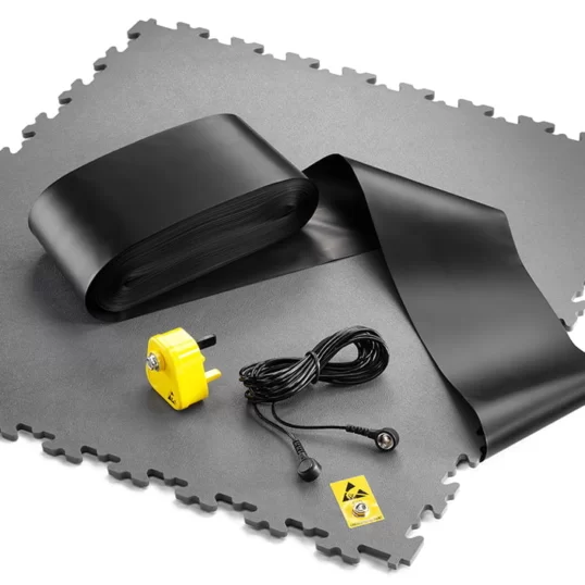 Photo of Ecotile's ESD flooring tile and an ESD installation kit with conductive grounding tape and bonding plug